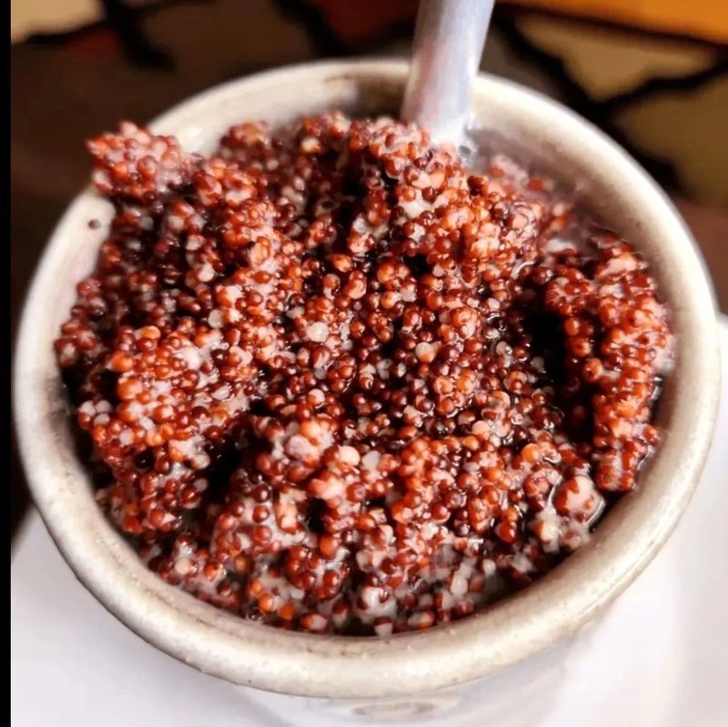 Fermented red millet packed into a Tongba vessel with a Pipsing